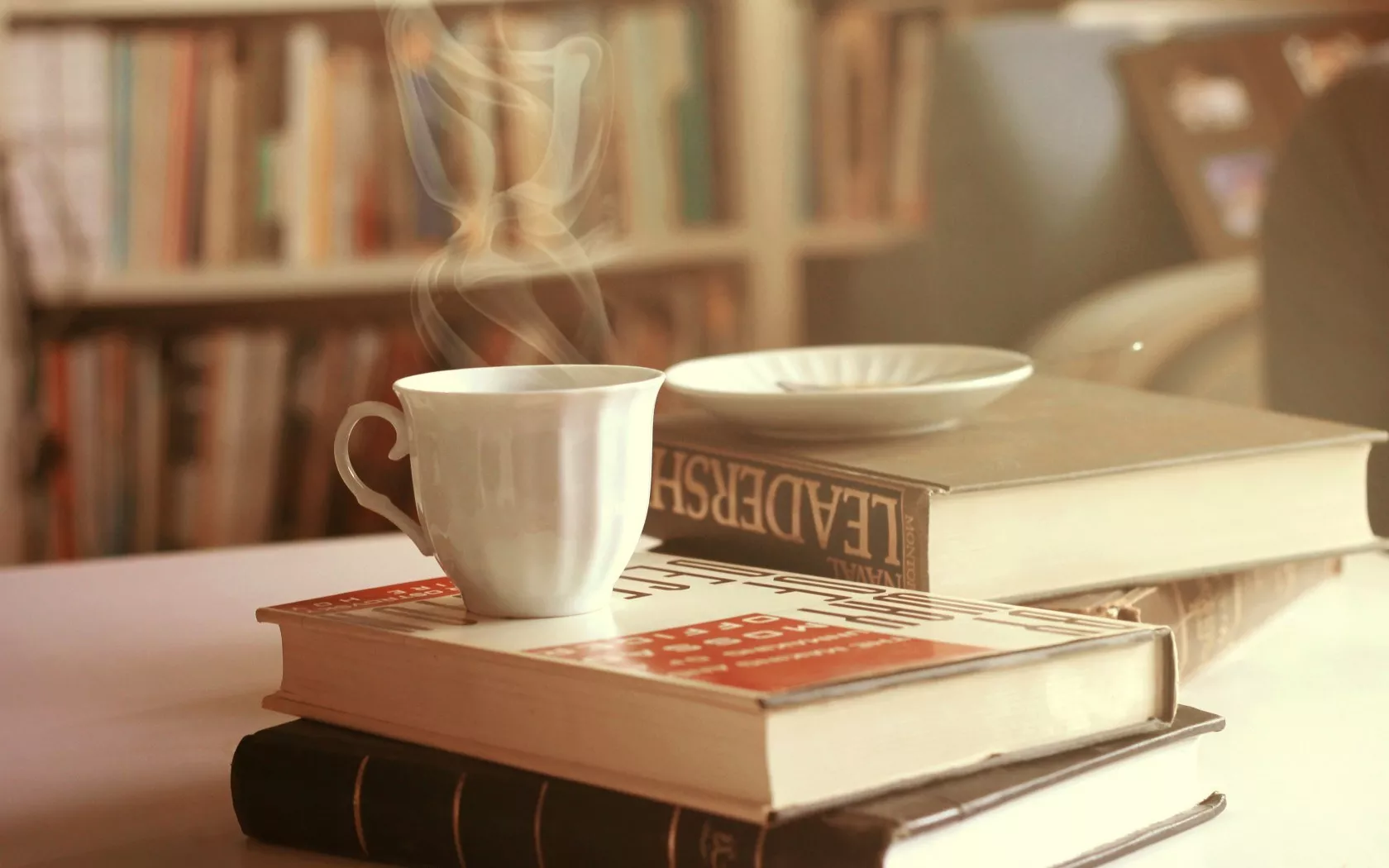 cup books wallpaper 1680x1050